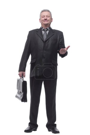 Photo for "Happy business man standing with briefcase isolated over white b" - Royalty Free Image