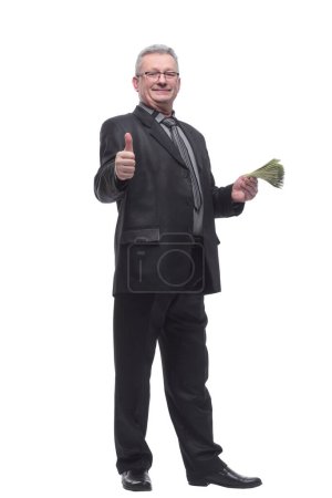 Téléchargez les photos : Homme âgé tenant un tas de billets sur fond isolé - en image libre de droit