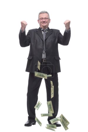 Téléchargez les photos : "Heureux homme d'affaires avec des dollars qui descendent" - en image libre de droit