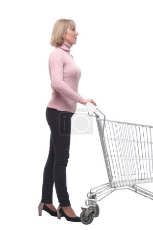 Photo for Full length portrait of a woman pushing a shopping trolley - Royalty Free Image