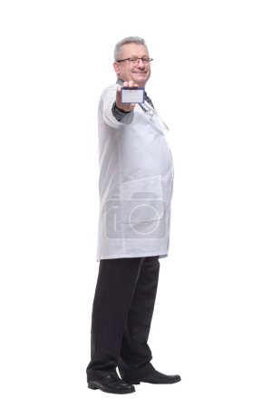 Photo for "Friendly medical doctor with blank mediical ID's card" - Royalty Free Image