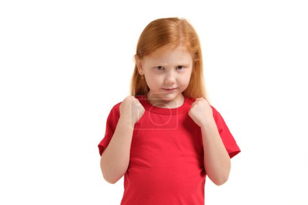 Photo for Close-up portrait mad young girl about to have nervous atomic breakdown, fist up in air, angry with someone isolated white background. - Royalty Free Image