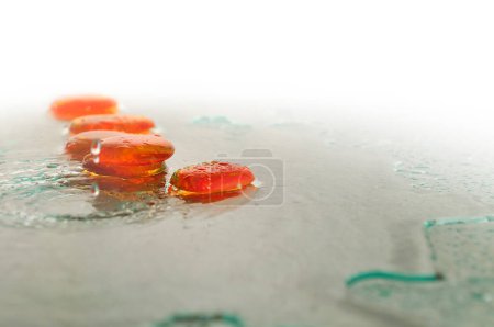 Photo for Isolated wet zen stones with splashing  water drops - Royalty Free Image