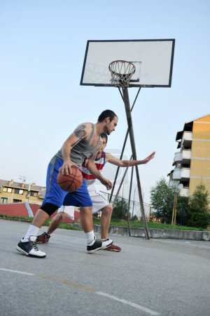 Photo for Streetball  game at early morning - Royalty Free Image