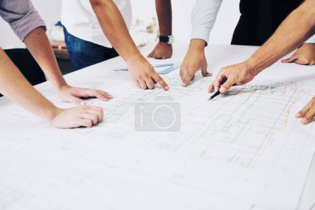 Photo for Team of architects on construction site - Royalty Free Image