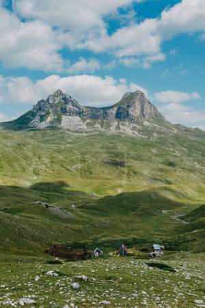 Photo for "The mountain pass Sedlo is in the north of Montenegro. Fantastic green view of Saddle mountain, Durmitor massive, Montenegro" - Royalty Free Image