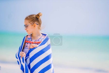 Photo for Adorable little girl at beach during summer vacation - Royalty Free Image