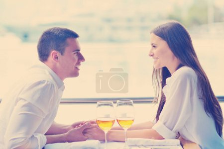 Photo for Couple having lunch at beautiful restaurant - Royalty Free Image