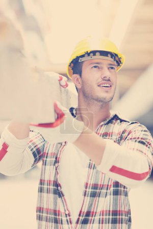 Photo for Hard worker on construction site" - Royalty Free Image