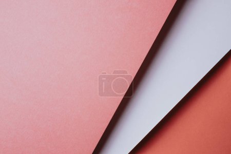 Foto de Abstract pink orange and white and yellow color paper geometry composition background with shapes, minimalist shadows, copy space. Minimal geometric shapes. Colorful background concept - Imagen libre de derechos