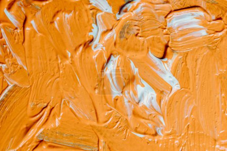Téléchargez les photos : Abstract acrylic and watercolor painting. Canvas background with a paint brush, Orange and white color - en image libre de droit