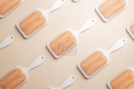 Photo for Combs, hairdresser tools on skin color background top view mockup pattern, minimalism, beauty style concept - Royalty Free Image