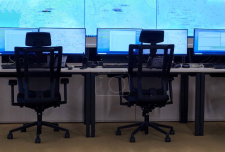 Photo for "Empty interior of big modern security system control room" - Royalty Free Image