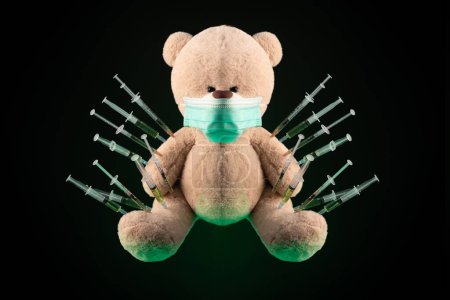 Téléchargez les photos : Vaccination des enfants contre le virus covid19 et vaccinations sur l'exemple d'un ours en peluche - en image libre de droit