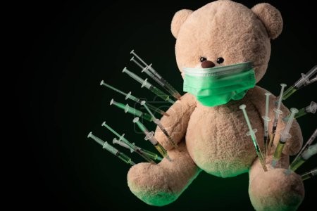 Photo for Children's vaccination against the covid19 virus and vaccinations on the example of a teddy bear - Royalty Free Image