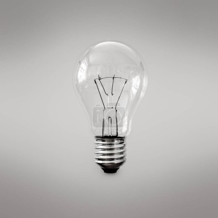 Photo for "light bulb on grey background" - Royalty Free Image