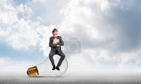 Photo for Young businessman with a book - Royalty Free Image