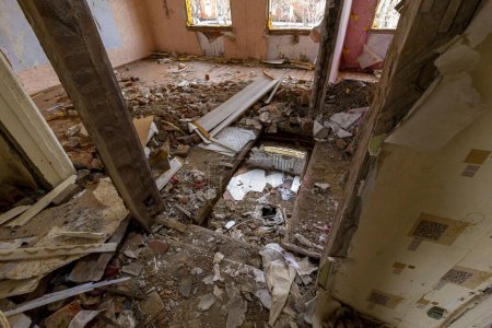 Photo for "Destroyed floor of the apartment on the second storey of the house abandoned by the residents. Destroyed by an explosion residential apartment building." - Royalty Free Image