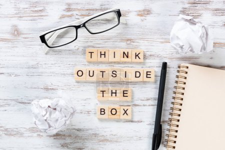 Photo for Think outside the box quote with letters - Royalty Free Image