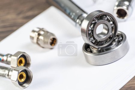 Photo for Plumbing pipeline and ball bearings - Royalty Free Image