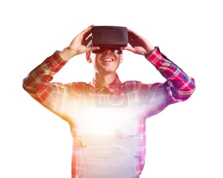 Photo for "Guy wearing checked shirt and virtual mask demonstrating some emotions" - Royalty Free Image