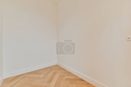 Photo for "Spacious empty room with parquet floor" - Royalty Free Image
