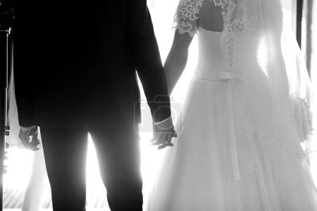 Photo for "Closeup view of married couple holding hands" - Royalty Free Image