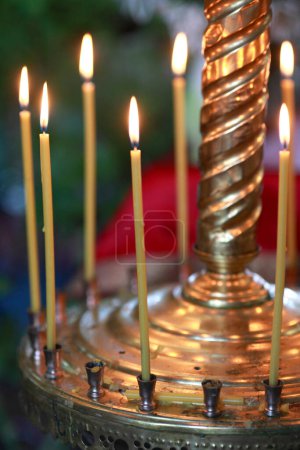 Photo for "Church candles on the background bokeh" - Royalty Free Image