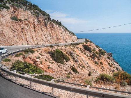 Photo for Mountain serpentine road along Mediterranean sea. Demre Finike Yolu road . Turkey. - Royalty Free Image
