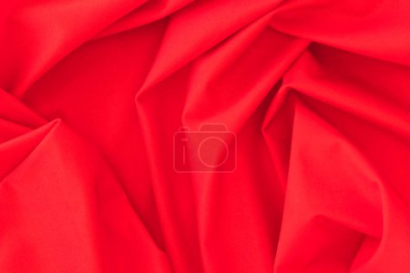 Photo for Folded red textile fabric texture background - Royalty Free Image