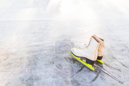 Photo for Figure skates cracked ice - Royalty Free Image
