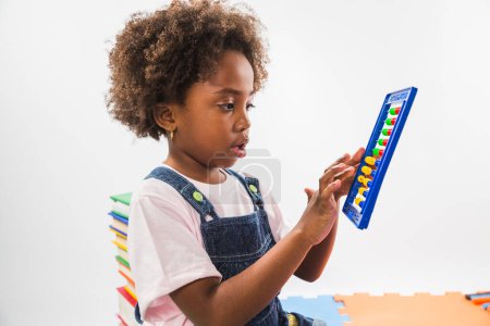Photo for Cute kid with abacus studio - Royalty Free Image