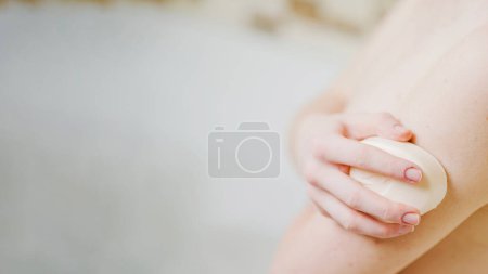 Photo for Anonymous girl washing with soap - Royalty Free Image