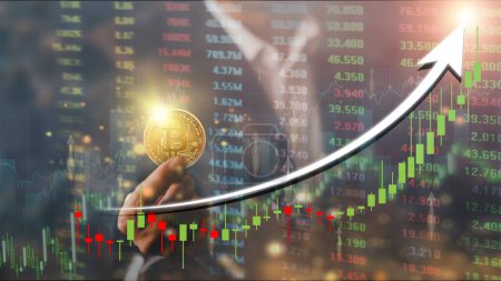 Téléchargez les photos : "Hands of businessman with gold bitcoin coin. Volatile business graph on global network, Financial, Stock market, Cryptocurrency and investment. Stock market graph up. New Virtual money concept" - en image libre de droit