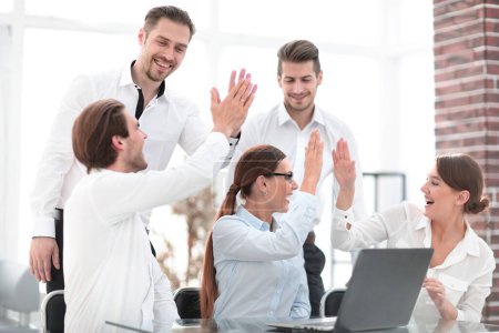 Photo for Business team starts a business project and giving each other a high five - Royalty Free Image