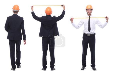 Photo for "in full growth .a qualified architect in an orange helmet" - Royalty Free Image