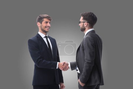 Foto de Two business people shaking hands. isolated on white - Imagen libre de derechos