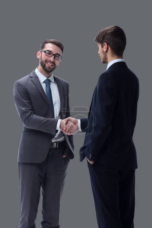 Photo for In full growth. business people shaking hands - Royalty Free Image