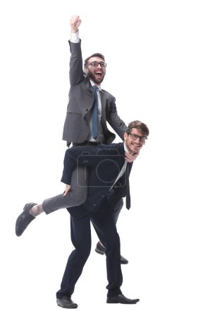 Foto de Feliz hombre de negocios llevando a su colega a cuestas - Imagen libre de derechos