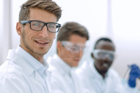 Photo for "group of young scientists in the laboratory" - Royalty Free Image