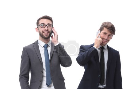 Photo for Two businessmen using their smartphones - Royalty Free Image