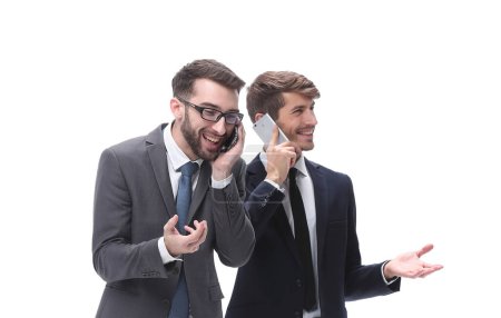 Foto de Dos hombres de negocios usando sus teléfonos inteligentes - Imagen libre de derechos