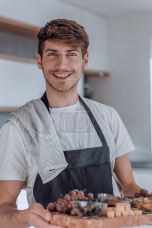 Photo for "attractive young man showing them cooked Breakfast" - Royalty Free Image