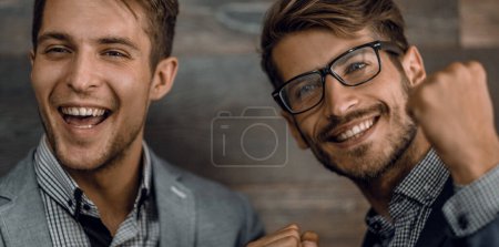 Photo for Best friends enjoying isolated over grey background. - Royalty Free Image