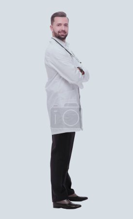 Photo for In full growth. smiling medical specialist inviting you - Royalty Free Image