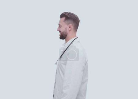 Photo for "in full growth. a successful doctor is a therapist with a stethoscope" - Royalty Free Image