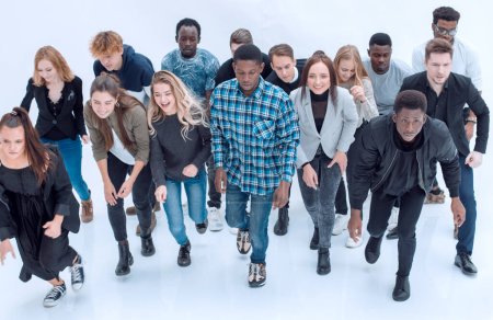 Photo for "large group of diverse young people starting forward" - Royalty Free Image