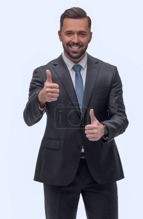 Foto de "longitud completa .smiling hombre de negocios mostrando pulgares hacia arriba
" - Imagen libre de derechos