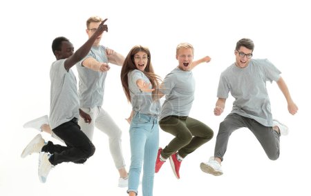 Photo for "casual group of happy young people jumping" - Royalty Free Image