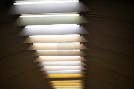 Photo for "Light on ceiling. Fluorescent lamps." - Royalty Free Image